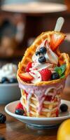 Delicious dessert with whipped cream, fresh fruits, and waffle cone stacked high on a plate in a cozy cafe setting photo
