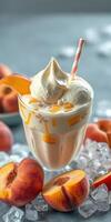 Creamy peach dessert served in a glass with fresh peaches and ice photo