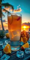 Refreshing tropical drink served at sunset on a beach with fresh fruit and ice photo