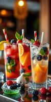 Refreshing fruit cocktails with vibrant colors served in tall glasses at a lively bar setting photo