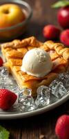 Delicious homemade fruit pie topped with ice cream served on a plate with fresh strawberries and ice photo
