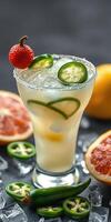 Refreshing cocktail garnished with fresh ingredients, served in a glass with ice and fruits photo