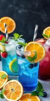 Refreshing summer drinks with vibrant colors and fresh fruit garnishes at a sunny outdoor gathering photo