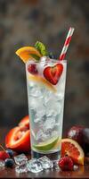 Refreshing summer cocktail garnished with fruits and mint served in a tall glass photo