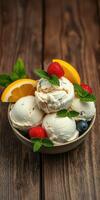 Delicious ice cream bowl with fresh fruits including raspberries, lemon, and mint on a wooden table photo