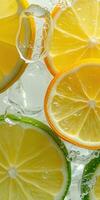 Fresh citrus slices in clear water creating vibrant reflections and bubbles in a refreshing arrangement photo