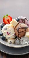 Colorful dessert platter featuring multiple ice cream flavors and fresh fruits on a rustic wooden table photo