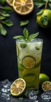 Refreshing lime drink garnished with mint leaves served in a tall glass on a dark background photo
