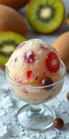Colorful fruit sorbet served in a glass dish surrounded by fresh fruits on a textured surface photo