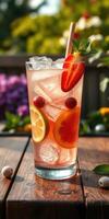 Refreshing summer drink with fresh fruit on a sunny afternoon in a garden setting photo