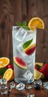 Refreshing summer drink with watermelon, lemon, and mint displayed on a wooden table photo