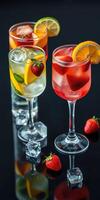 Refreshing fruit cocktails with ice and fresh berries on a dark background for summer enjoyment photo