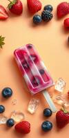 Colorful fruit popsicle surrounded by fresh berries on an orange background photo