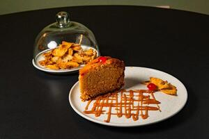 a plate of food with a piece of cake on it and a piece of cake on it. photo