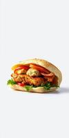 Delicious spicy chicken sandwich with fresh vegetables served in a sesame bun for a satisfying meal option photo