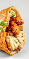 Tasty wrap filled with spiced chicken pieces and creamy sauce, showcasing vibrant flavors and fresh ingredients photo