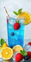 Refreshing summer drink with vibrant colors garnished with fresh fruit and ice photo
