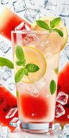 Refreshing watermelon lemonade with mint and ice on a bright background photo