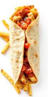 Tasty wrap filled with grilled chicken, vegetables, and tangy sauce served with crispy fries on a white background photo