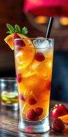 Refreshing summer cocktail featuring raspberries and citrus served in a tall glass with ice photo