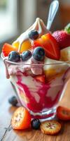Mouthwatering dessert with fresh fruit, creamy yogurt, and vibrant berry sauce on a sunny afternoon photo