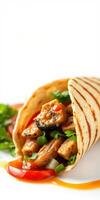 Delicious chicken wrap filled with fresh ingredients and vibrant colors ready to be enjoyed in a casual dining setting photo