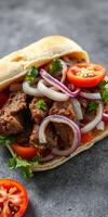 Delicious sandwich with grilled beef, fresh vegetables, and herbs served on soft bread in a casual setting photo