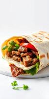 Savory meat wrap with fresh vegetables and herbs on a light background photo