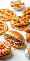 Delicious fast food spread featuring burgers, pizza, and chicken appetizers for a casual gathering or celebration photo