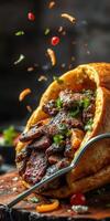 Delicious beef wrapped in a soft bread with spices and garnishes served on a rustic wooden board photo