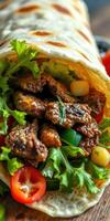 Savory grilled meat wrap filled with fresh vegetables and rolled in soft flatbread at a local eatery photo
