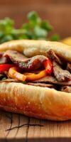 Delicious sandwich filled with grilled meat and colorful peppers on a rustic wooden table photo