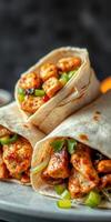 Delicious spicy chicken wraps filled with fresh vegetables ready to be enjoyed at a casual dining setting photo