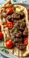 Savory grilled meat skewers served on a flatbread with fresh cherry tomatoes and herbs photo