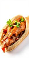 Delicious grilled chicken with spicy sauce served in a warm flatbread photo