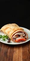 Delicious burrito filled with a mix of savory meats and fresh vegetables resting on a wooden table photo