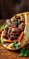 Savory grilled meat wrapped in pita bread with fresh vegetables and herbs served on a wooden surface photo