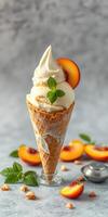 Delicious ice cream cone topped with peach slice and mint leaves presented on a marble surface photo