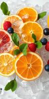 Fresh fruits garnished with mint on crushed ice for a refreshing summer drink photo