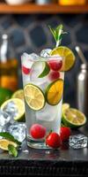 Refreshing summer beverage with ice, lime, and fresh berries amidst a vibrant setting photo