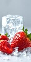 Fresh strawberries with ice cubes creating a refreshing summer treat arrangement on a light background photo