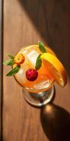 Refreshing summer cocktail garnished with fresh fruits and mint placed on a wooden surface photo