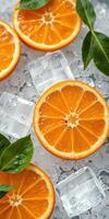 Fresh orange slices arranged on ice with vibrant green leaves showcasing a refreshing summer element photo