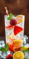 Refreshing fruit drink with vibrant flavors and garnishes served in a tall glass photo