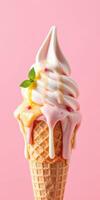 Delicious ice cream cone topped with swirls of strawberry and vanilla flavors photo