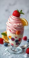 Delicious dessert featuring fresh fruit and creamy whipped toppings in a glass cup with vibrant colors photo