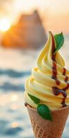 Delicious soft serve ice cream cone with chocolate syrup against a sunset beach background photo