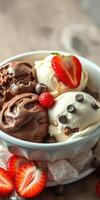 Tempting bowl of chocolate, vanilla, and strawberry ice cream with fresh berries and chocolate chips photo