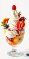 Delicious layered fruit sundae topped with creamy soft serve and fresh berries in a glass dish photo
