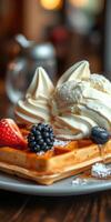 Delicious waffle served with whipped cream and fresh berries on a wooden table in a cozy cafe photo